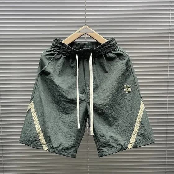 Estilo coreano Street Wear moda macacão Shorts masculino Casual solto calças de cinco pontos na moda de secagem rápida p
