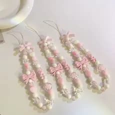 Cordão para celular feminino, decoração delicada e charmosa com miçangas e laço em formato de coração, alça de mão para