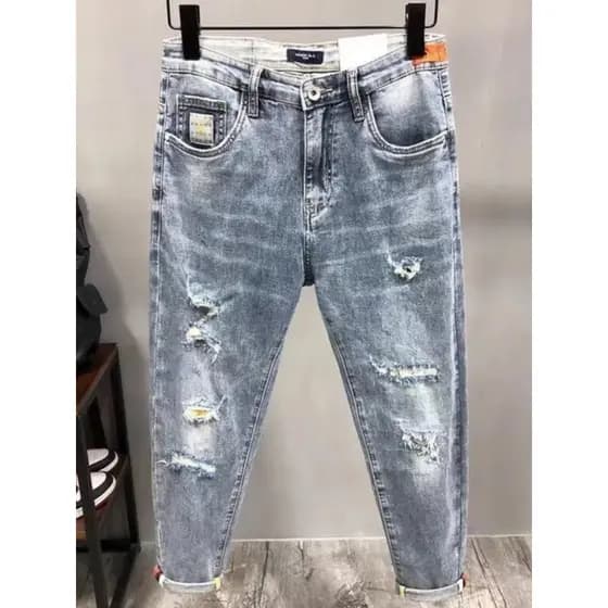 Comércio exterior cauda pedido ins Street Wear rasgado Jeans masculino fino-ajuste pés pequenos verão fino luz azul torn