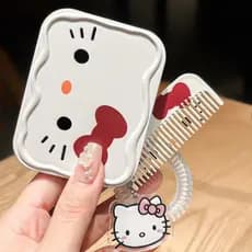 Espelho de maquiagem dobrável Hello Kitty, com um laço fofo e pente portátil.