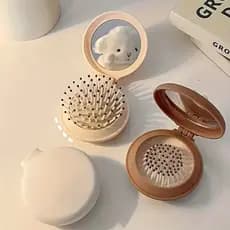 Mini Escova de Cabelo Dobrável Portátil Com Espelho Feminino - Portátil e Perfeita Para Bolsa Viagem