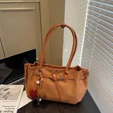High-End camurça portátil saco de boliche feminino 2025 novo estilo na moda nicho axilas saco grande capacidade