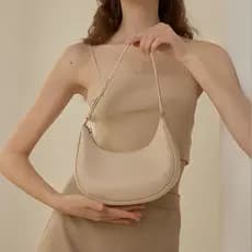 Simples único bolinho portátil 2026 High-End crescente saco nicho feminino bolsa de ombro axilas sentir francês novo est