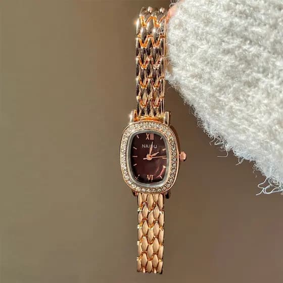 Xiaoxiang estilo Gypsophila rosa ouro relógio feminino moda elegante temperamento Oval pequeno mostrador luz luxo requin