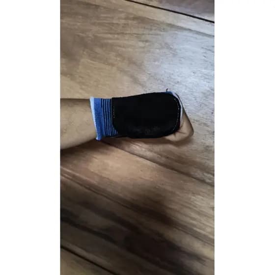 Munhequeira de elástico e couro