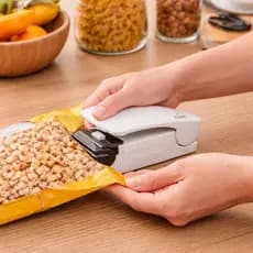 Seladora Mini Portátil Clink Lacra Saco Plástico Fecha Embalagens Alimentos Rápido e Prático
