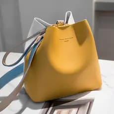 Bolsa feminina coreana da moda, bolsa de ombro diagonal tipo balde, versão 2025, bolsa de mão colorida, estilo casual de