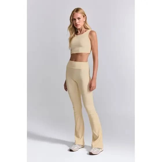 Conjunto Fitness Arm com Top Nadador e Legging Flare em Poliamida Canelada Bege Champagne