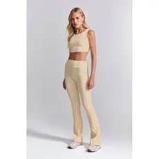 Conjunto Fitness Arm com Top Nadador e Legging Flare em Poliamida Canelada Bege Champagne