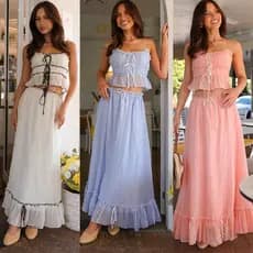 Nova coleção de roupas femininas para o verão de 2025: conjunto de top com laço e saia plissada estilo fada.