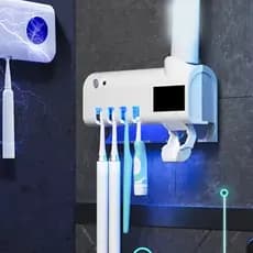 Distribuidor automático de pasta de dente com esterilizador ultravioleta e porta escova de dentes