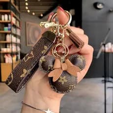 Presente de feriado de luxo clássico letra L fantasia couro criativo casal chaveiro bonito Mickey pingente carro chaveir