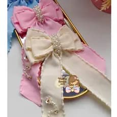 Laço com borda de pompom, laço com calda, laço pontas- Delicadeza e estilo para todos os momentos.