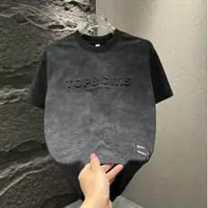 Verão novo estilo cor sólida mancha versão coreana meia manga na moda aço selo carta de manga curta Casual camiseta masc