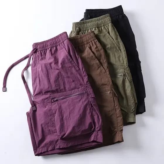 Verão High-End Multi-bolso macacão reto quarto Shorts masculino de secagem rápida ao ar livre solto Casual praia cinco @
