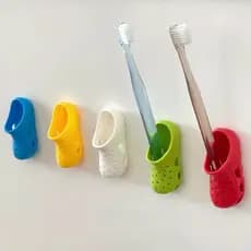 Criativo buraco sapato forma escova de dentes titular fixado na parede Rack de armazenamento do banheiro posição cor