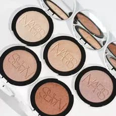 Pó Iluminador Compacto NARS Daylight Meteor Delicate Water Glow para Contorno 3D 6g EROS/ELECTRA maquiagem