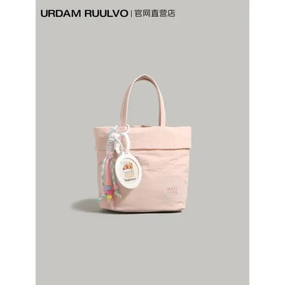 UR rosa simples lona balde saco feminino 2026 novo estilo na moda Casual bolsa All-Match Commuter ombro saco do mensagei