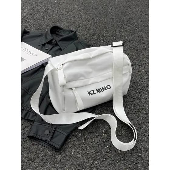 Estudante festa carta bolsa de lona feminina 2025 novo estilo nicho literário saco do mensageiro de um ombro branco Supe