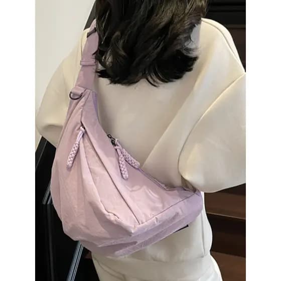 Saco de bolinho de grande capacidade feminino 2026 novo estilo leve banda larga saco do mensageiro náilon lona Commuter