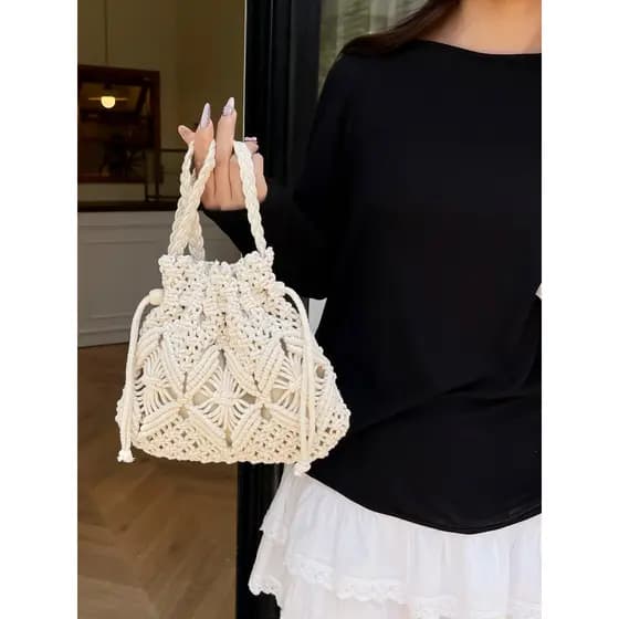 Bolsa feminina 2025 novo estilo Super quente verão oco tecido pequeno saco nicho Design All-Match palha saco do mensagei