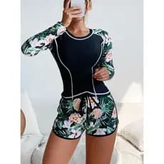Conjunto de duas peças para mergulho feminino: maiô com estampa tropical e roupa de praia