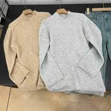 Primavera Festival entrega camisola cor sólida solto pulôver meia gola alta manga longa Casual nicho Design outono topo