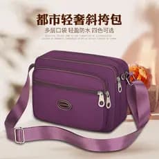 Bolsa de lona 2024 novo estilo feminino saco do mensageiro feminino Oxford pano mãe de meia-idade pequena mochila náilon