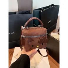 Moda bonito dos desenhos animados Mini saco feminino 2025 novo estilo camurça All-Match um ombro cruz-corpo chave batom