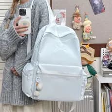 Clássico simples bordado arco júnior estudantes do ensino médio Campus mochila nicho japonês cor sólida mochila de compu