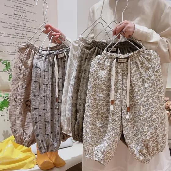 Crianças gelo seda linho verão estilo fino Anti-mosquito calças meninos meninas solto moda Casual estilo ocidental Flora
