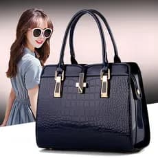 Bolsa feminina 2026 novo estilo primavera verão couro envernizado bolsa em formato brilhante bolsa mensageiro de ombro v