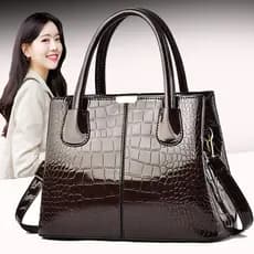 Bolsa feminina novo estilo bolsa de couro brilhante grande capacidade bolsa de ombro padrão de pedra Retro exportação mo
