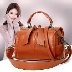 Bolsa feminina 2026 novo estilo moda bolsa de couro macio Boston travesseiro saco simples All-Match um ombro pequeno sac