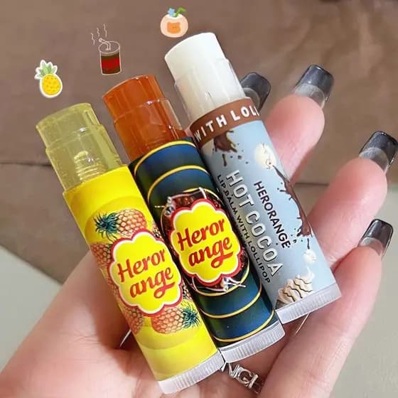 HERORANGE ~ HERORANGE Pirulito Bálsamo Labial Cacau Quente Máscara Labial Hidratante Hidratante Desbotamento Linhas Labi