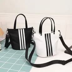 Mão transportar contraste cor listrado balde saco feminino 2024 novo estilo versão coreana nicho na moda Casual bolsa de