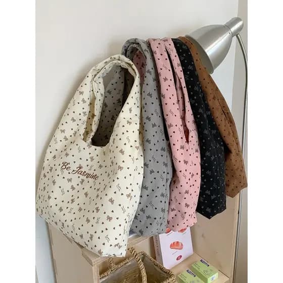 Versão coreana Polka Dot lona sacola feminina grande capacidade Commuter Casual bolsa de ombro All-Match leve Underar