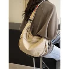 Alça de ombro larga Casual bolsa mensageiro feminina 2026 versão coreana novo estilo moda lona bolinho saco grande capac