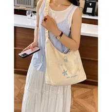 Bolsa mensageiro de lona bordada literária feminina 2026 verão novo estilo festa de estudante bolsa Casual de grande cap