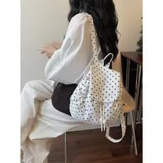 Versão coreana Polka Dot leve mochila feminina 2026 novo estilo moda grande capacidade pequena mochila cordão estudante