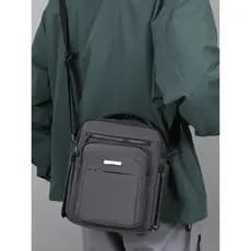 Bolsa de ombro masculina bolsa mensageiro 2026 novo estilo simples Multi-bolso mochila mensageiro de lona de negócios ma