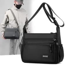Bolsa de ombro masculina 2026 novo estilo na moda grande capacidade saco do mensageiro Oxford pano bolsa de ombro mascul