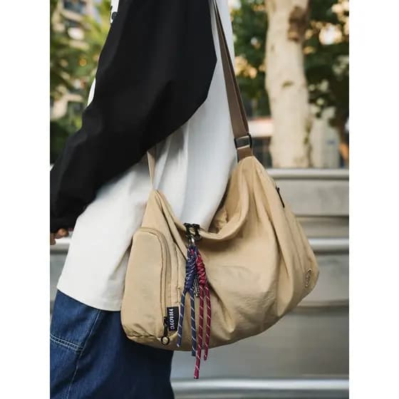 Bolsa de ombro masculina estilo japonês 2026 novo estilo simples grande capacidade saco do mensageiro ins na moda legal