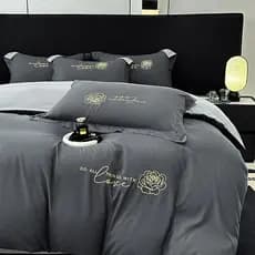 Conjunto de quatro peças bordado estilo luxo leve algodão puro lençol capa de edredão conjunto de três peças cor sólida