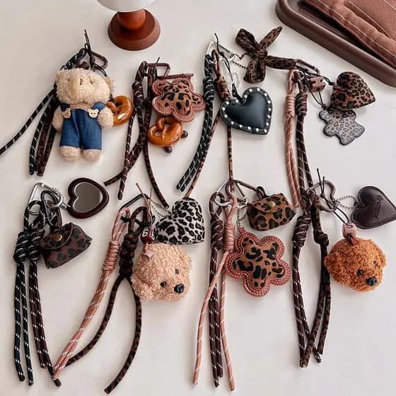 Miu série pequeno bonito couro leopardo impressão saco pingente carro chaveiro leopardo impressão Xu Aoxue amor saco pin