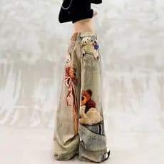 Calças jeans femininas de corte reto com estampa de urso, design moderno e elegante de 2026, calças largas e soltas com