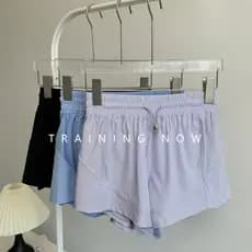 Shorts esportivos soltos femininos verão Anti-reflexo maratona correndo calças de três pontos de secagem rápida Yoga Fit