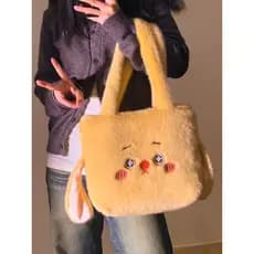 Bonito dos desenhos animados bolsa de pelúcia feminina 2025 novo portátil grande capacidade estudante Commuter saco de a