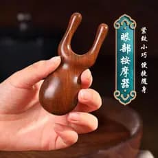 [Xinjiang frete grátis] pente de massagem de sândalo pequeno sapo olho rosto nariz ponte cabeça meridiano raspador Nasal