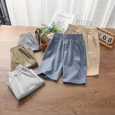 Crianças Shorts verão 2026 novo estilo calças versão coreana médio grande crianças soltas estilo fino meninos esportes c